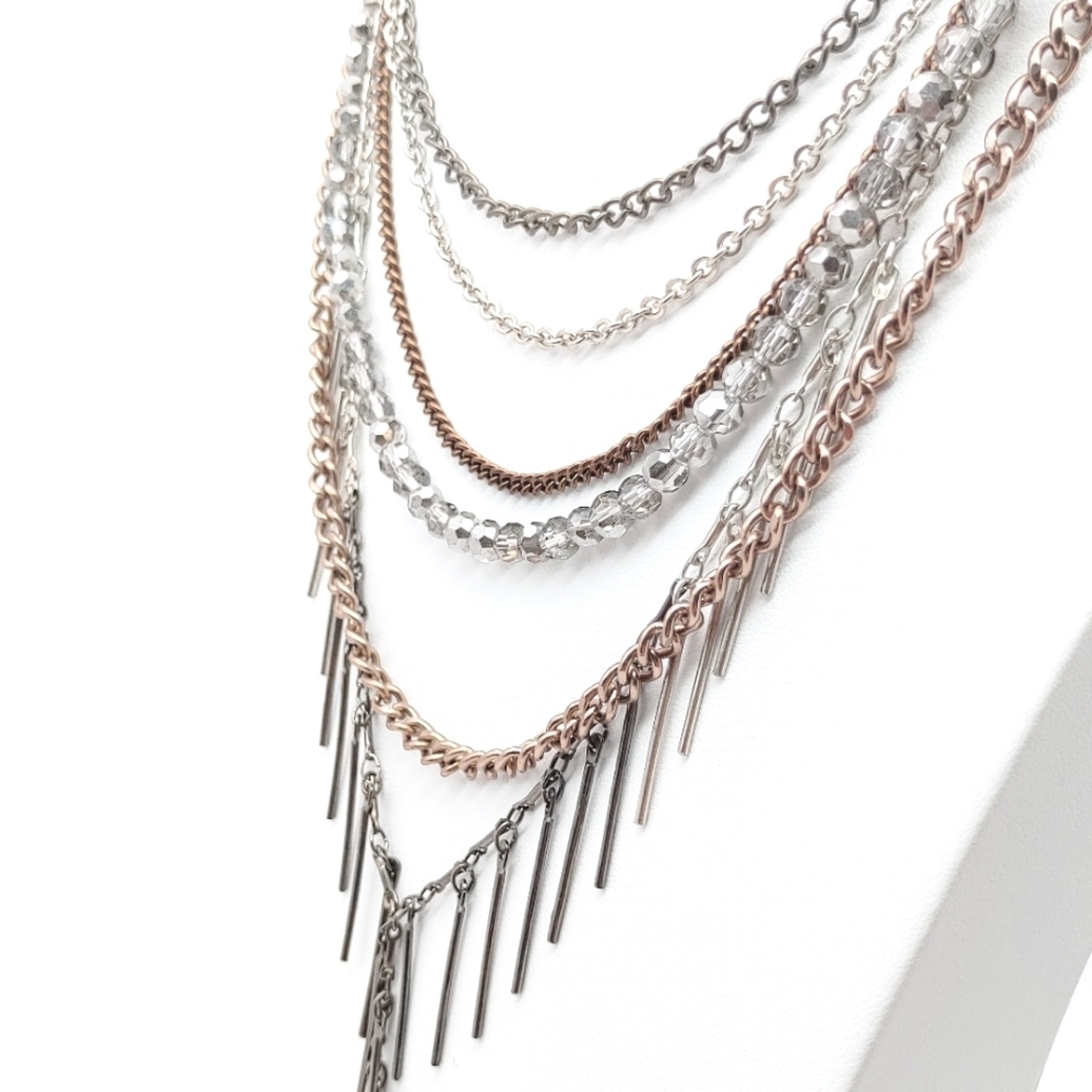 EUC Necklace 6 strands of various metals, styles, and colors 17-20in neck + drop